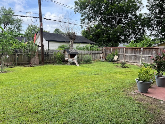 8823 Shadow Crest St, Houston, TX 77074 - fenced backyard with a storage unit