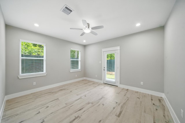 337 Todd St, Tomball, TX 77375 - empty room with wood finished floors, plenty of natural light, a ceiling fan, and recessed lighting