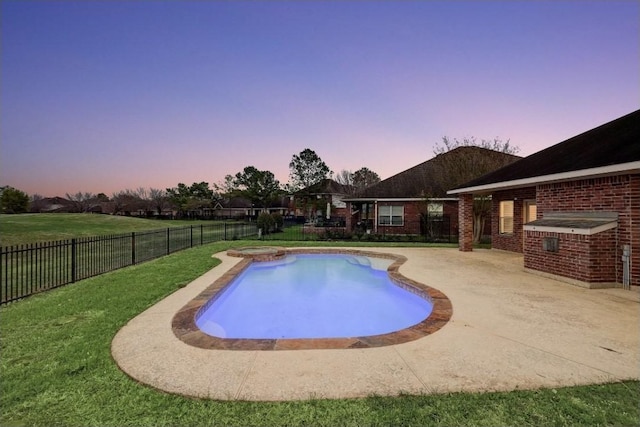 10531 Oleander Point Dr, Houston, TX 77095 - pool at dusk with a fenced backyard and a patio area