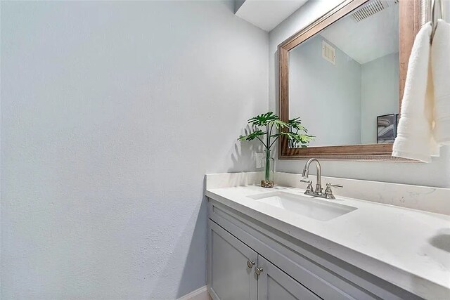 3406 Yoakum Blvd, Houston, TX 77006 - bathroom with vanity and baseboards