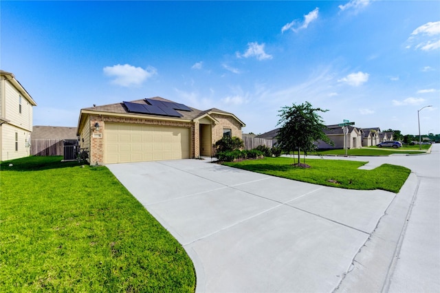 4338 Tulip Oak Dr, Houston, TX 77068 - ranch-style home with brick siding, solar panels, driveway, an attached garage, and a residential view