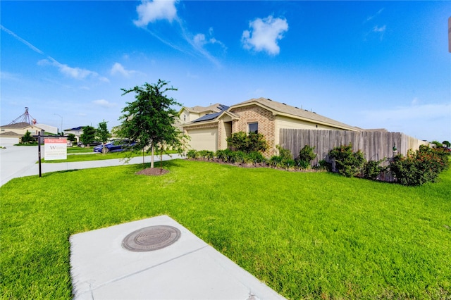 4338 Tulip Oak Dr, Houston, TX 77068 - view of yard featuring a garage