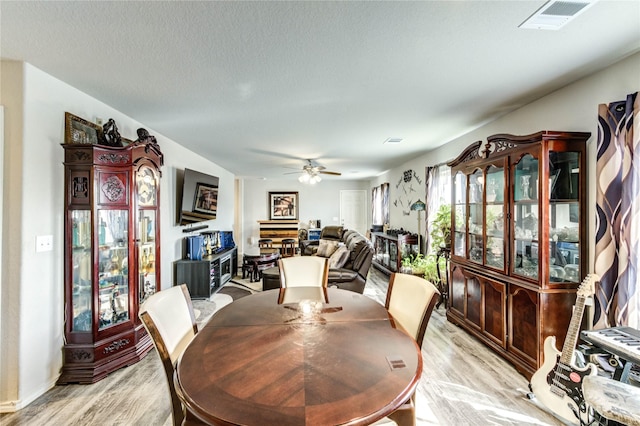 4338 Tulip Oak Dr, Houston, TX 77068 - dining room featuring a ceiling fan and light wood-type flooring