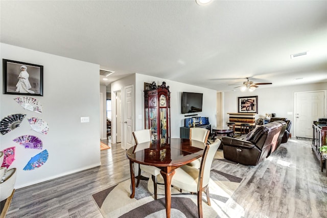 4338 Tulip Oak Dr, Houston, TX 77068 - dining space featuring wood finished floors and a ceiling fan