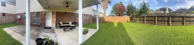 15415 Longhorn Cavern Dr, Sugar Land, TX 77498 - fenced backyard featuring ceiling fan and a patio