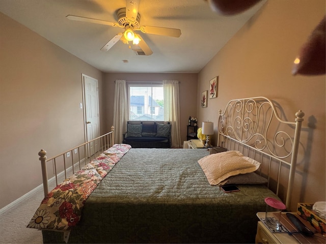 15415 Longhorn Cavern Dr, Sugar Land, TX 77498 - carpeted bedroom featuring baseboards and a ceiling fan