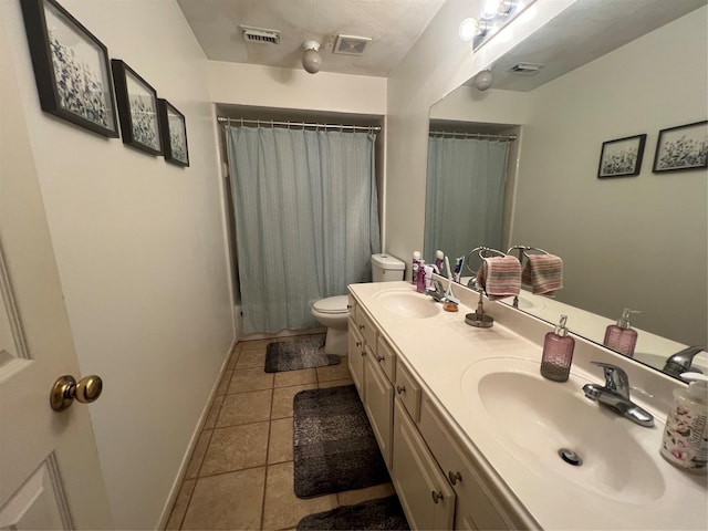 15415 Longhorn Cavern Dr, Sugar Land, TX 77498 - bathroom featuring double vanity, tile patterned floors, and a shower with shower curtain