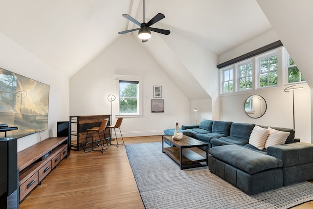 1114 Grovewood Ln, Houston, TX 77008 - living area featuring healthy amount of natural light, a ceiling fan, light wood-type flooring, and vaulted ceiling
