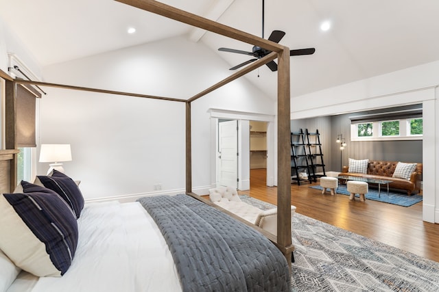 1114 Grovewood Ln, Houston, TX 77008 - bedroom with high vaulted ceiling, wood finished floors, beamed ceiling, ceiling fan, and recessed lighting