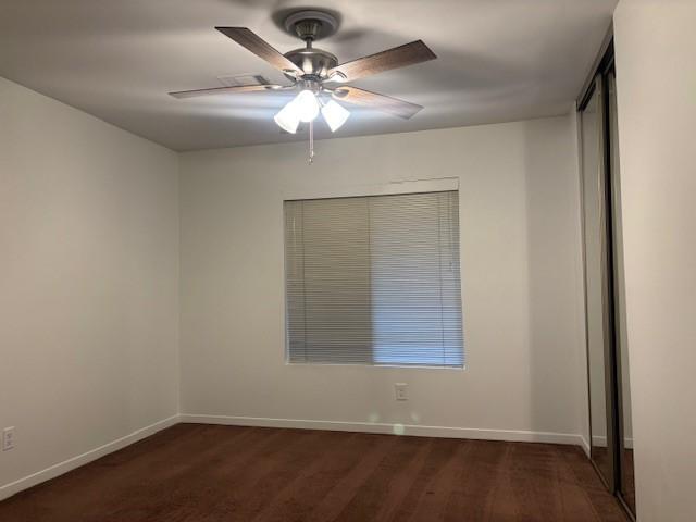 4418 Treasure Trl, Sugar Land, TX 77479 - unfurnished room featuring ceiling fan and dark wood-style floors