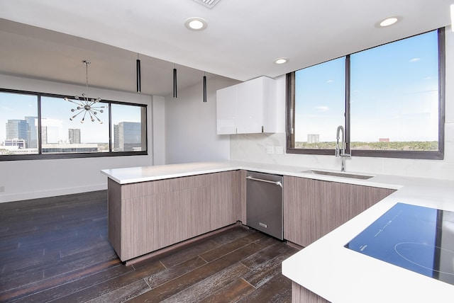 49 Briar Hollow Ln Unit 1106, Houston, TX 77027 - kitchen featuring dark wood finished floors, dishwasher, a peninsula, modern cabinets, and recessed lighting