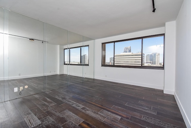 49 Briar Hollow Ln Unit 1106, Houston, TX 77027 - unfurnished room featuring wood finished floors