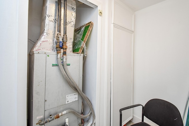 49 Briar Hollow Ln Unit 1106, Houston, TX 77027 - utility room featuring heating unit