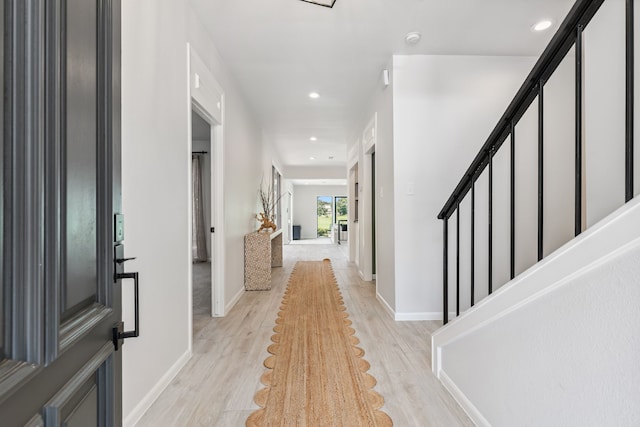 506 Fox Briar Ln, Sugar Land, TX 77478 - foyer featuring light wood-type flooring, stairway, and recessed lighting