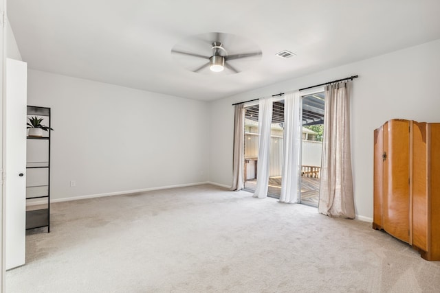 506 Fox Briar Ln, Sugar Land, TX 77478 - unfurnished bedroom featuring access to outside, carpet, and a ceiling fan