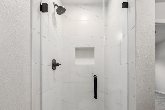 506 Fox Briar Ln, Sugar Land, TX 77478 - bathroom view of a marble finish shower
