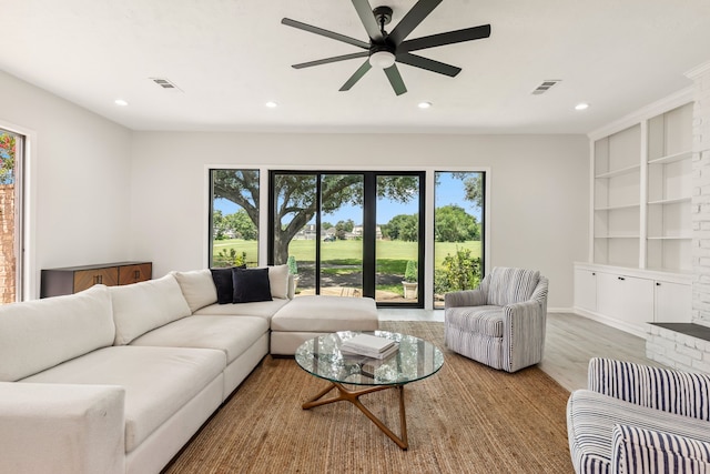 506 Fox Briar Ln, Sugar Land, TX 77478 - living area with plenty of natural light, recessed lighting, ceiling fan, and built in features