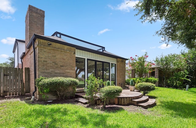 506 Fox Briar Ln, Sugar Land, TX 77478 - back of house featuring a chimney and brick siding