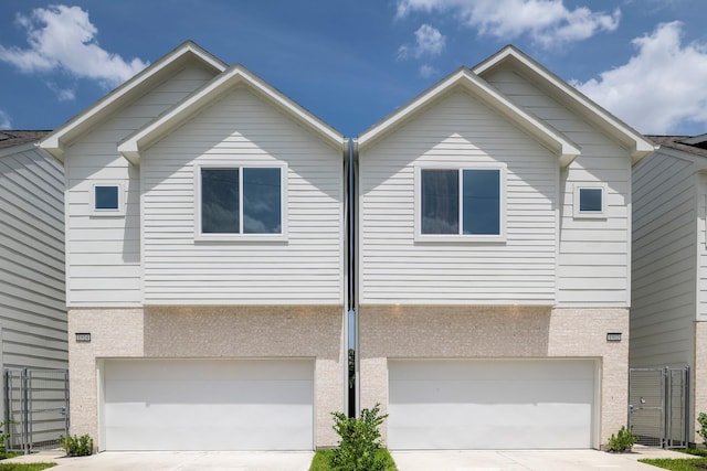 1912 Erastus St, Houston, TX 77020 - view of front of property with a garage and driveway