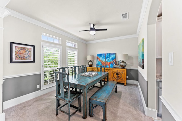 32647 Turning Springs Dr, Fulshear, TX 77423 - dining area with ceiling fan, light carpet, crown molding, and decorative columns