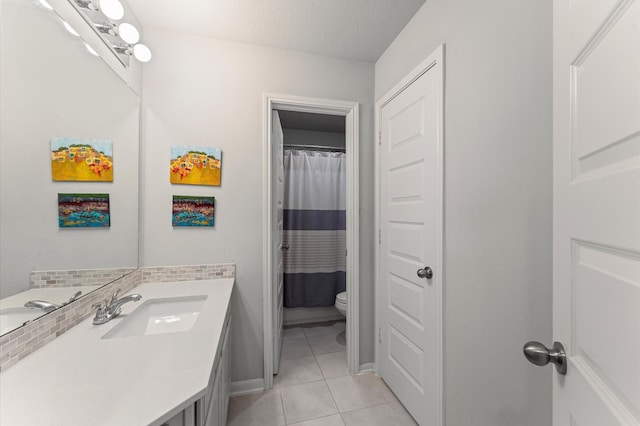 32647 Turning Springs Dr, Fulshear, TX 77423 - bathroom with tile patterned floors, vanity, and a shower with curtain