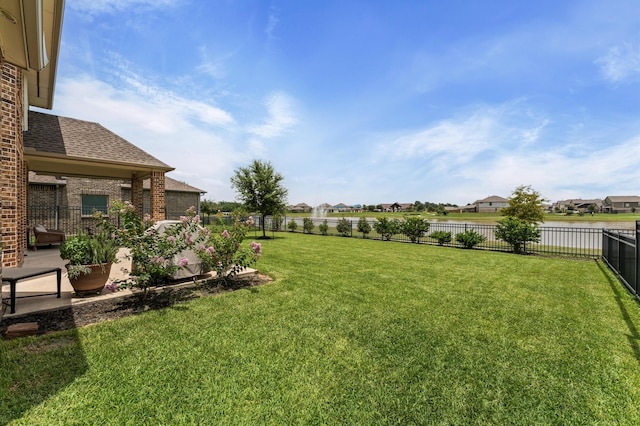 32647 Turning Springs Dr, Fulshear, TX 77423 - fenced backyard featuring a water view and a residential view