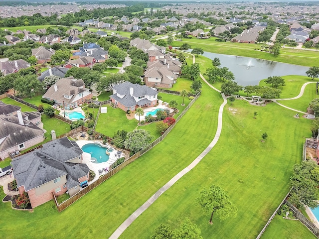 12702 Eagle Ledge Ln, Tomball, TX 77377 - aerial perspective of suburban area featuring a large body of water and a pool area
