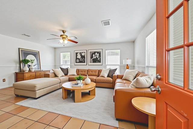 11937 Lakewood W Dr, Cypress, TX 77429 - living area featuring ceiling fan and light tile patterned floors