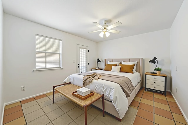 11937 Lakewood W Dr, Cypress, TX 77429 - bedroom featuring light tile patterned floors and ceiling fan