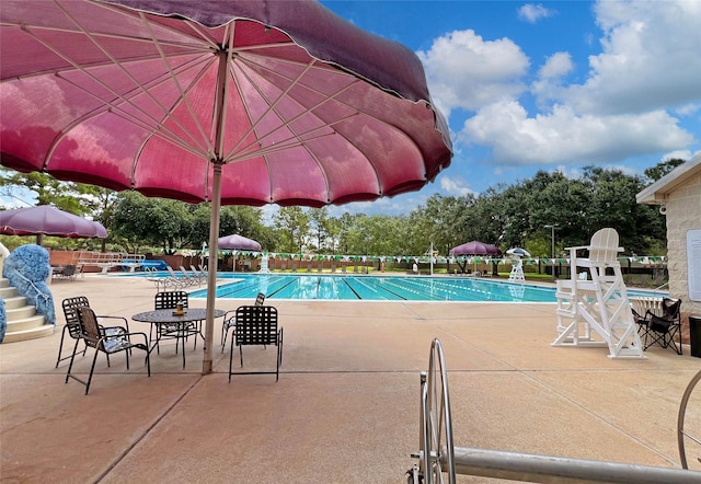 5403 Winlock Trace Ct, Katy, TX 77450 - community pool featuring a patio area