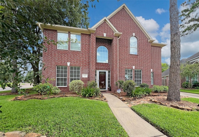5403 Winlock Trace Ct, Katy, TX 77450 - view of front facade with brick siding and a front yard
