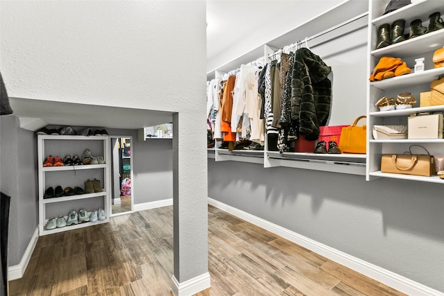 5403 Winlock Trace Ct, Katy, TX 77450 - spacious closet featuring wood finished floors