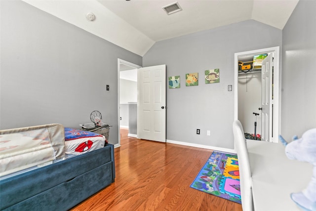 5403 Winlock Trace Ct, Katy, TX 77450 - bedroom featuring vaulted ceiling and wood finished floors