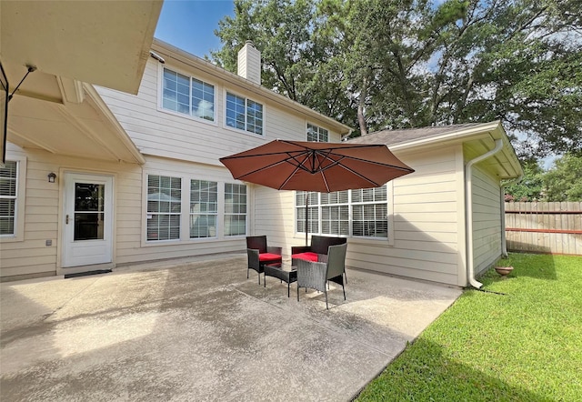 5403 Winlock Trace Ct, Katy, TX 77450 - back of property featuring a patio and a chimney