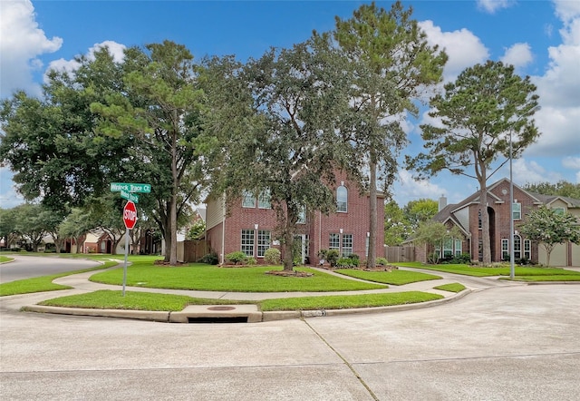 5403 Winlock Trace Ct, Katy, TX 77450 - view of front of house featuring brick siding and a front lawn