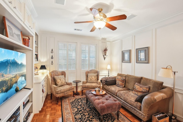 6230 Pebble Beach Dr, Houston, TX 77069 - living area featuring a decorative wall, ceiling fan, and crown molding