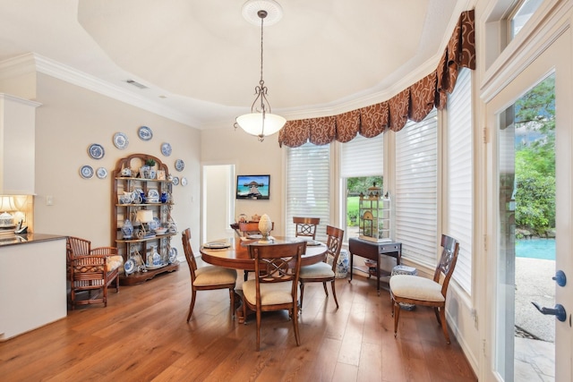 6230 Pebble Beach Dr, Houston, TX 77069 - dining space with hardwood / wood-style flooring and ornamental molding