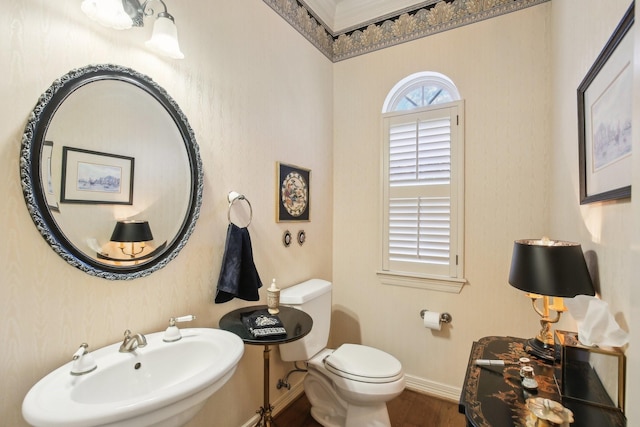 6230 Pebble Beach Dr, Houston, TX 77069 - half bathroom with a sink and wood finished floors