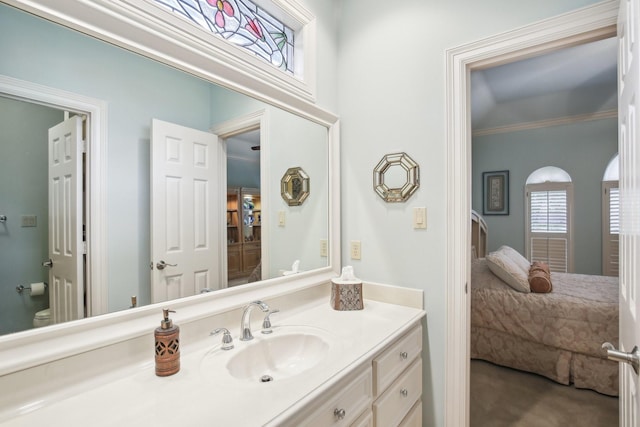 6230 Pebble Beach Dr, Houston, TX 77069 - bathroom featuring ensuite bathroom, vanity, and ornamental molding
