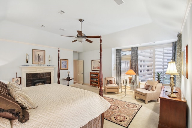 6230 Pebble Beach Dr, Houston, TX 77069 - bedroom with light carpet, a ceiling fan, and a tiled fireplace
