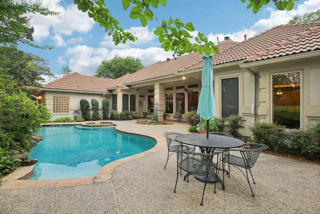 6230 Pebble Beach Dr, Houston, TX 77069 - view of pool with a patio, a pool with connected hot tub, and outdoor dining space