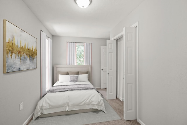 21146 Caney Dr, New Caney, TX 77357 - carpeted bedroom featuring baseboards