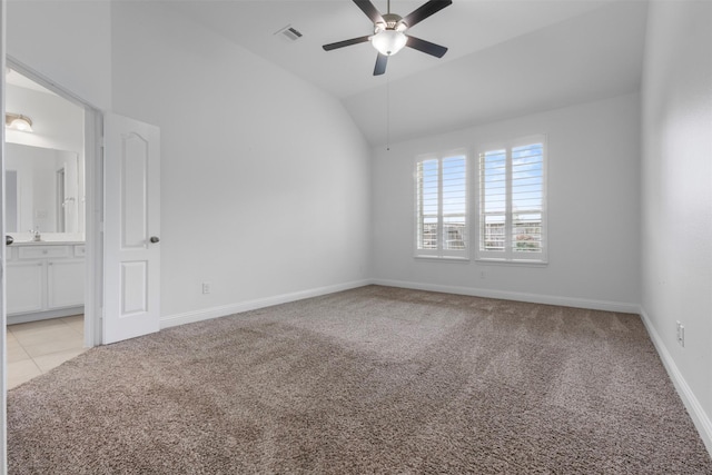 20123 Cascading Falls Blvd, Cypress, TX 77433 - unfurnished bedroom featuring light carpet, vaulted ceiling, ensuite bathroom, and a ceiling fan