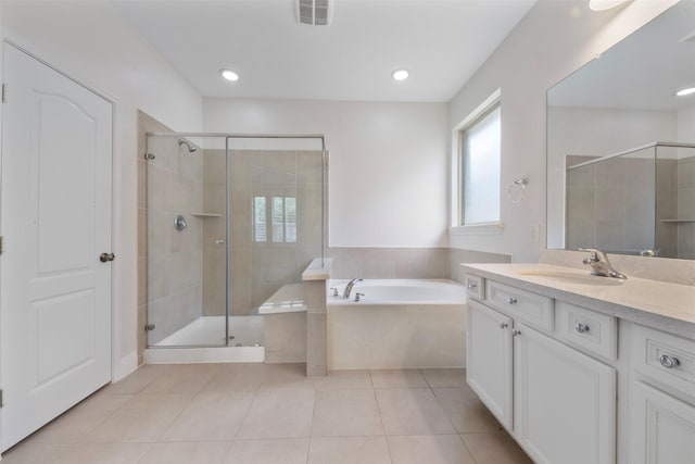 20123 Cascading Falls Blvd, Cypress, TX 77433 - full bath with a bath, vanity, a shower stall, tile patterned flooring, and recessed lighting