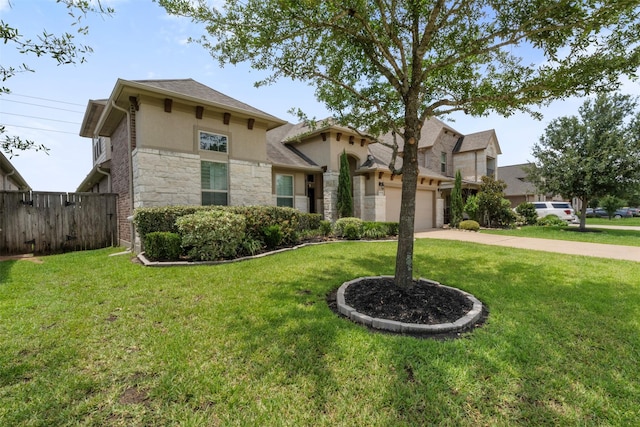 20123 Cascading Falls Blvd, Cypress, TX 77433 - view of front of house with stucco siding, stone siding, an attached garage, and driveway