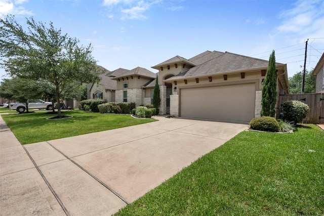 20123 Cascading Falls Blvd, Cypress, TX 77433 - view of front of property featuring an attached garage, concrete driveway, stone siding, and stucco siding