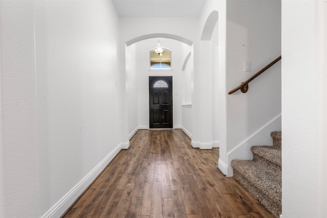 20123 Cascading Falls Blvd, Cypress, TX 77433 - entryway featuring wood-type flooring, arched walkways, and stairway