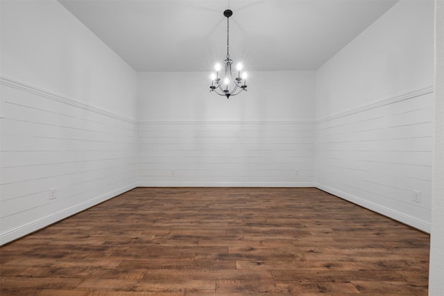 20123 Cascading Falls Blvd, Cypress, TX 77433 - empty room with a chandelier and dark wood-type flooring
