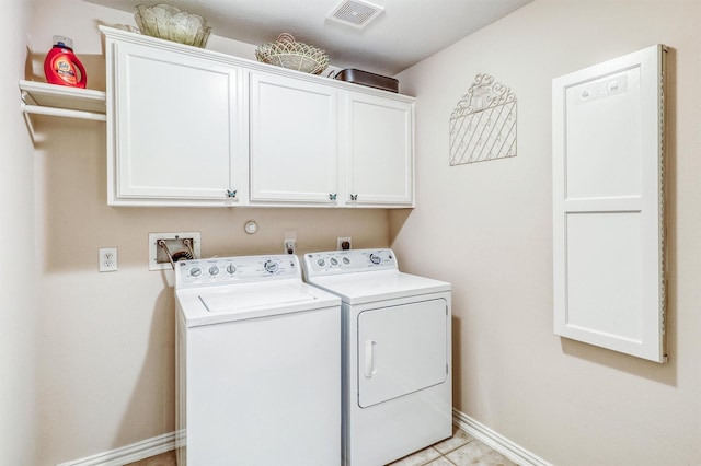 22806 Rachels Manor Dr, Katy, TX 77494 - washroom featuring cabinet space, separate washer and dryer, and light tile patterned flooring