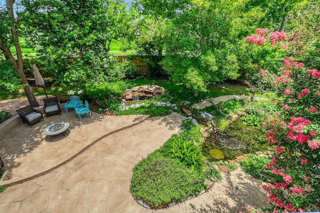 22806 Rachels Manor Dr, Katy, TX 77494 - view of yard featuring a patio area and a fire pit
